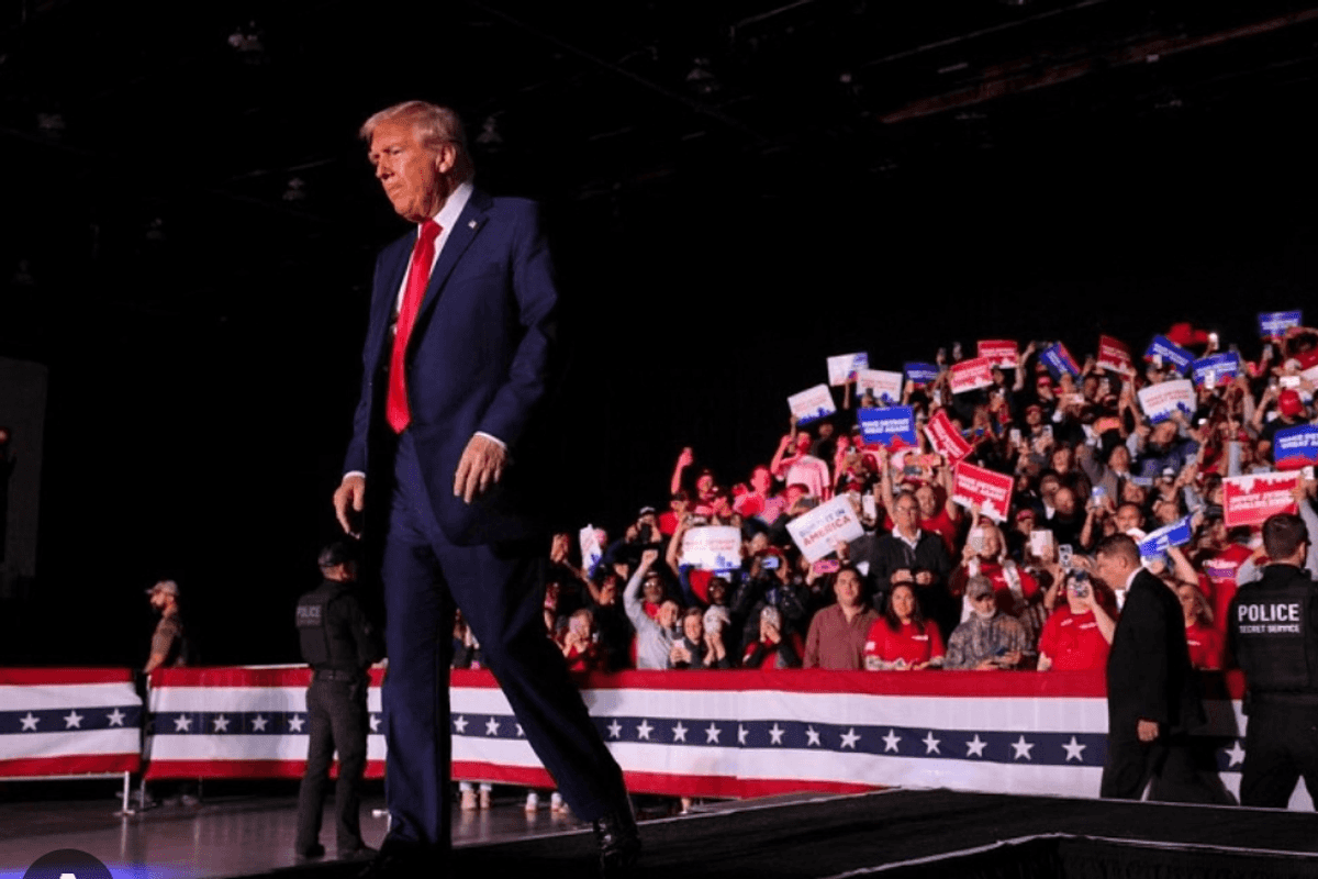 Trump Paces Onstage At 'Pretty Empty' Detroit Rally As Microphone Fails