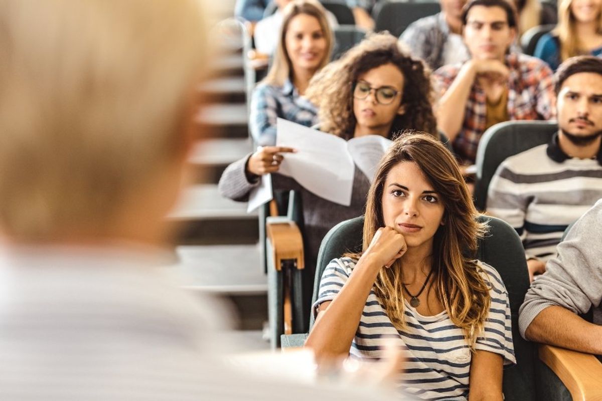 college students listenig to a professor