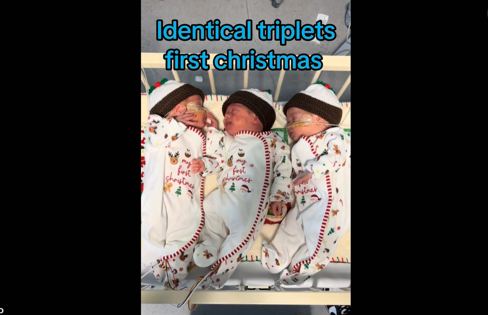 A couple struggling to get pregnant celebrates the surprise birth  of identical triplet boys