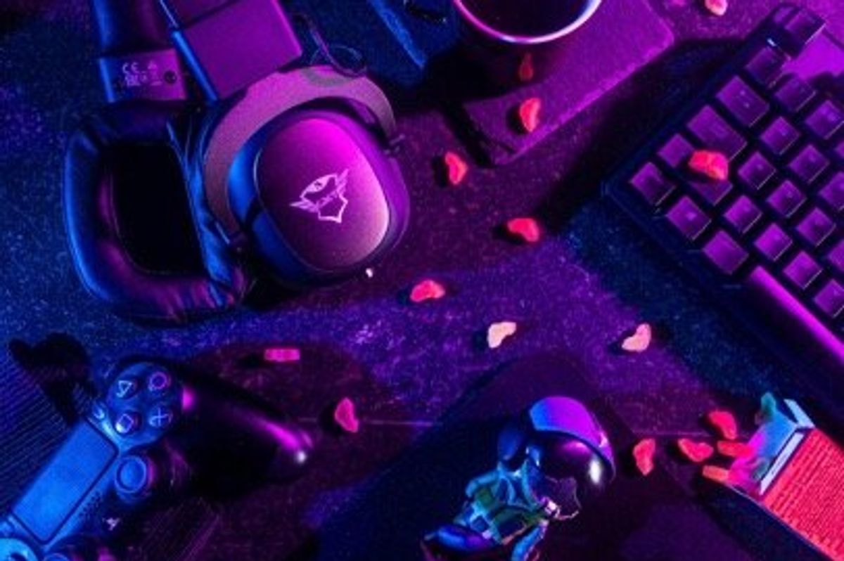 a photo showing video gaming controllers and headsets