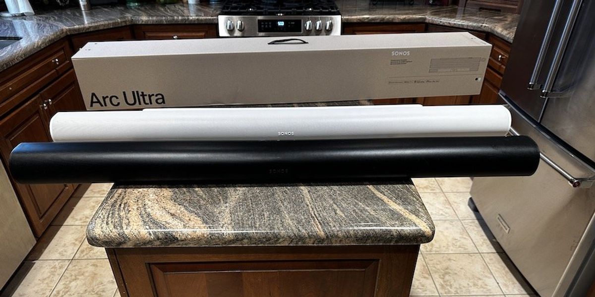 a photo comparing Sonos Arc with Sonos Arc Ultra soundbar