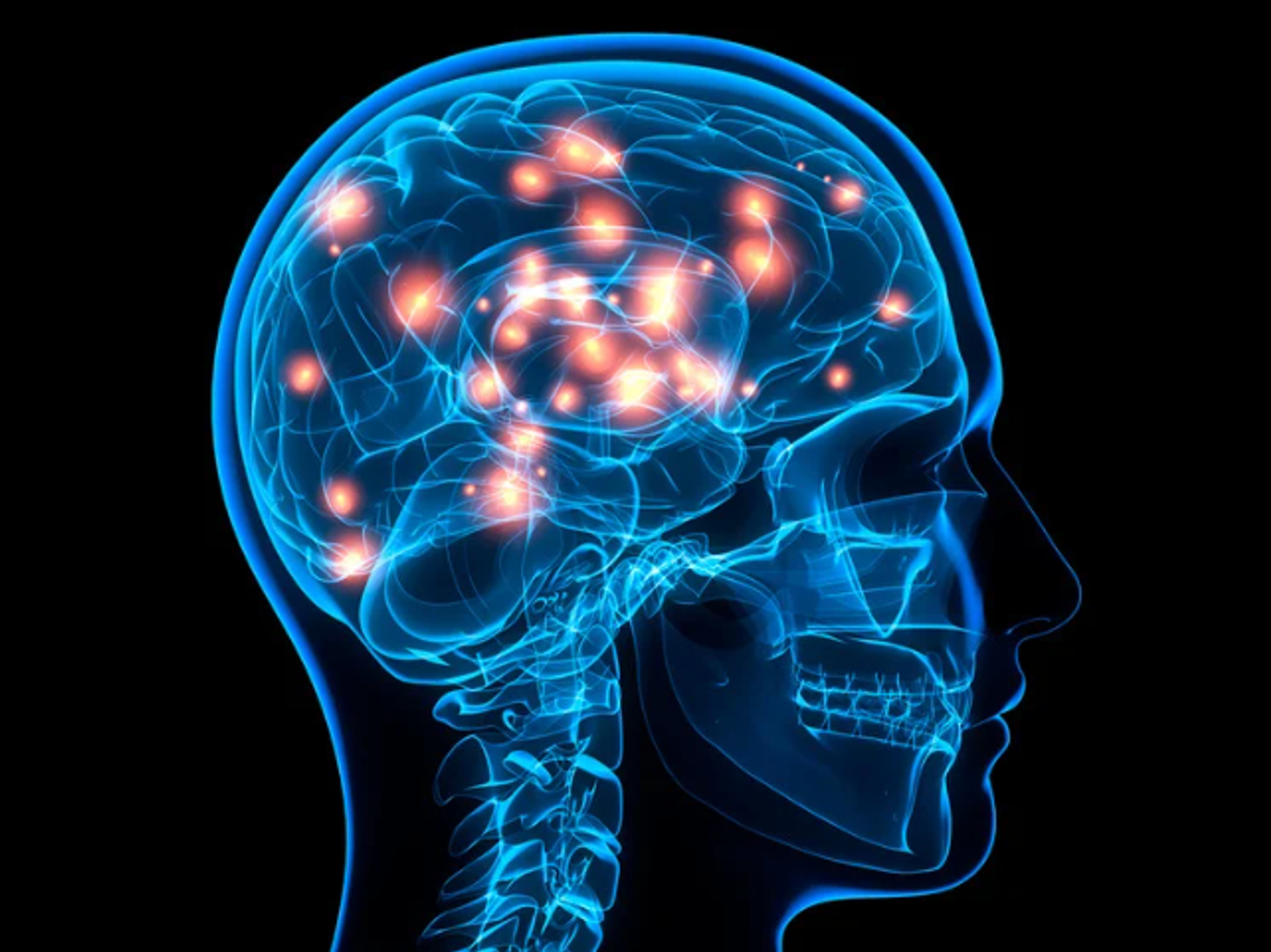 An x-ray look at the brain thinking, with sparks indicating thought patterns
