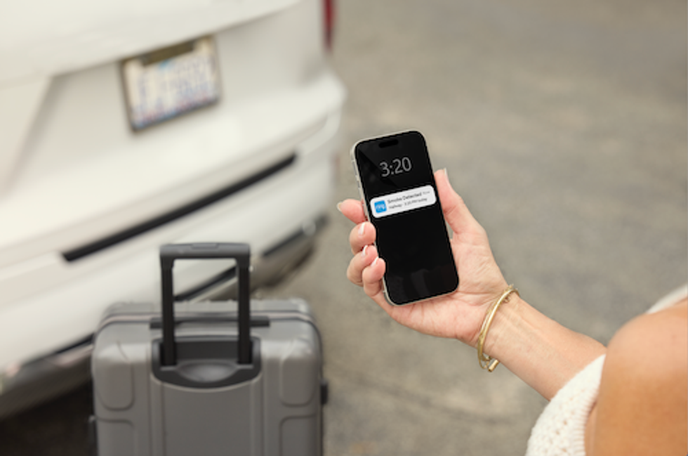 photo of Ring app on a smartphone showing Kidde alarm notification