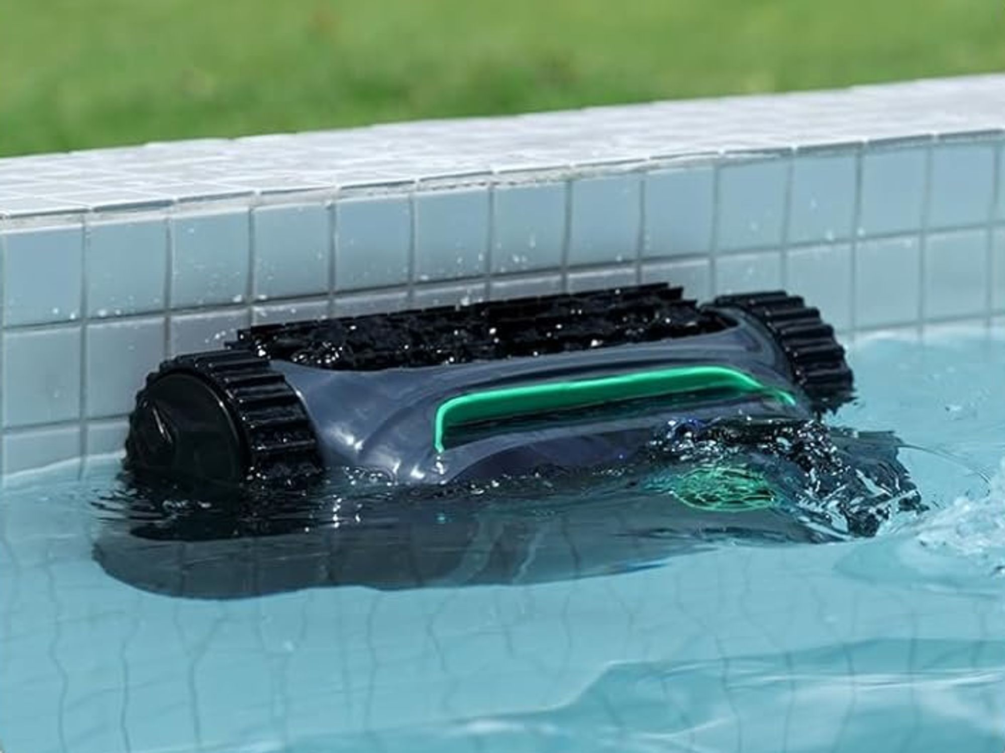 A photo of Wybot S2 Pro Robot Pool Cleaner on the side of a wall in the water