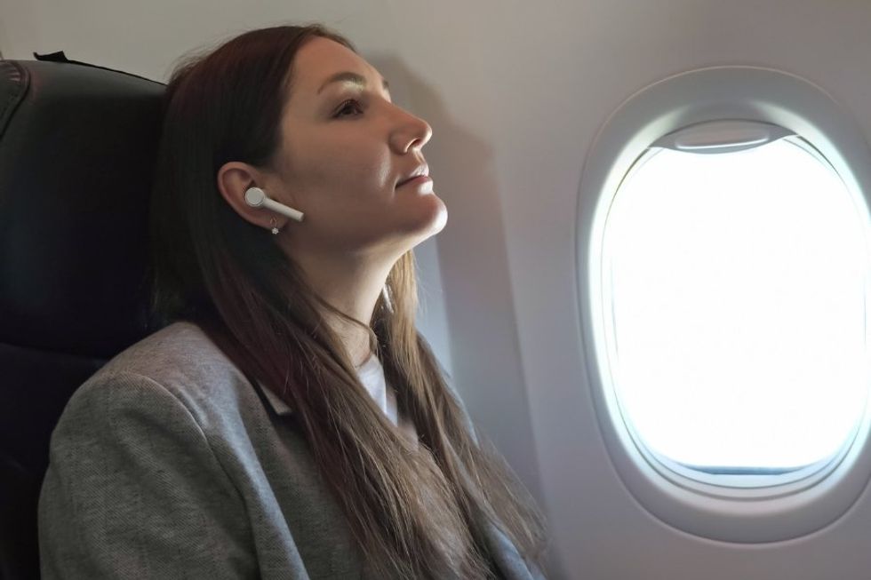 woman wearing earbuds