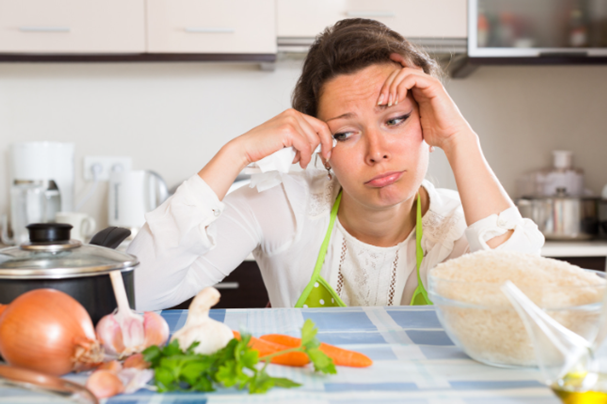 sad woman, woman cooking, kitchen