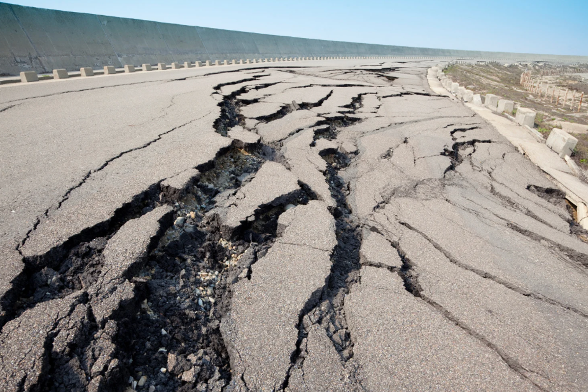 Deep cracks in a road