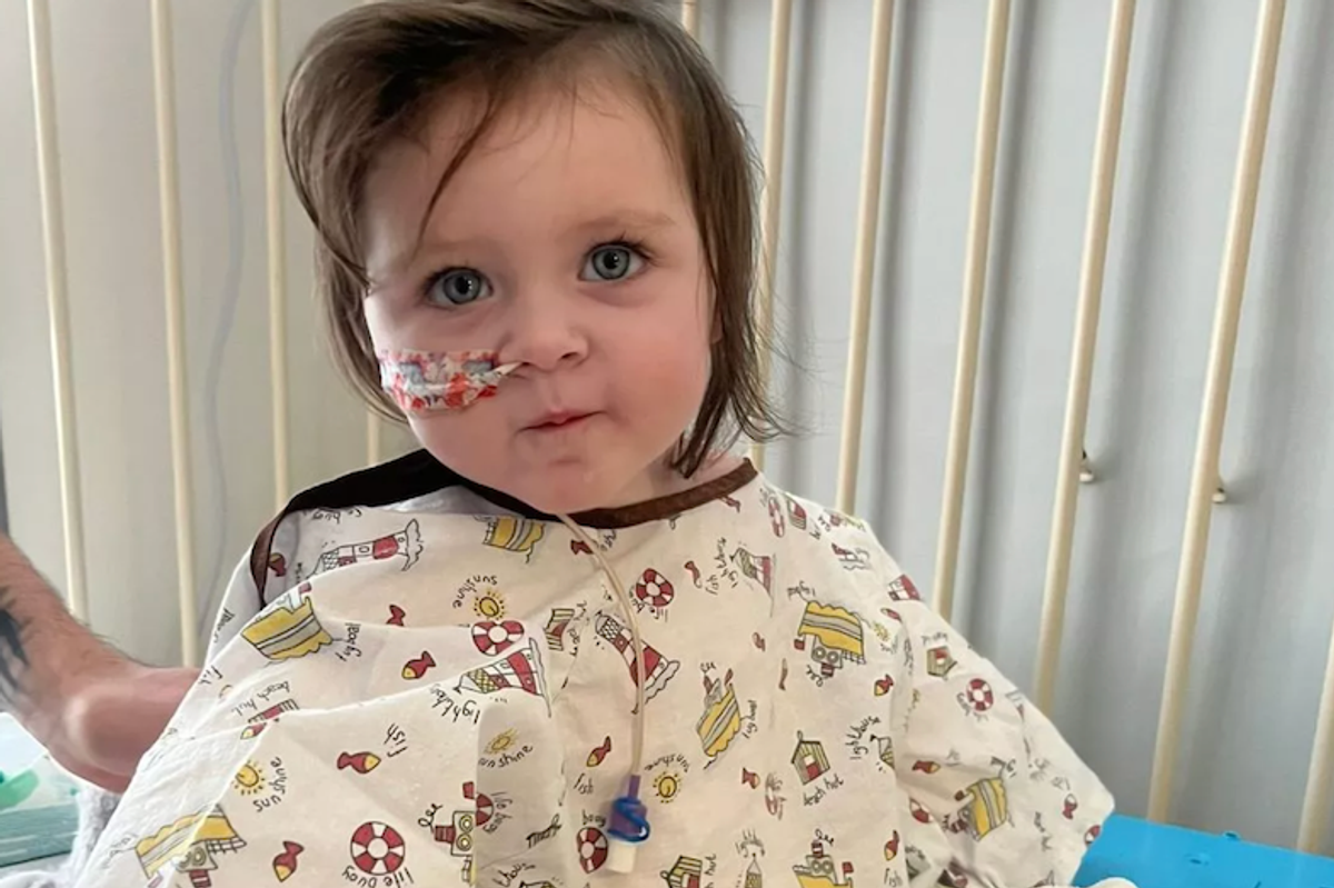 Toddler girl in a hospital bed