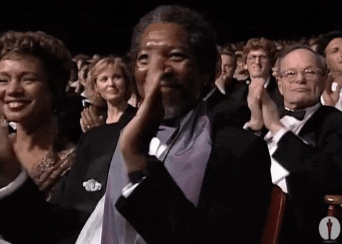 Morgan Freeman applauds at the Oscars