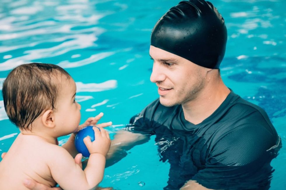 Swim coach's reaction when toddler tries to kiss him is a masterclass in teaching boundaries