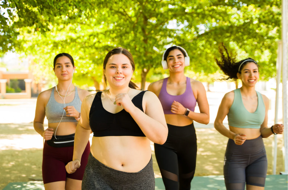 A group of women jogging outside