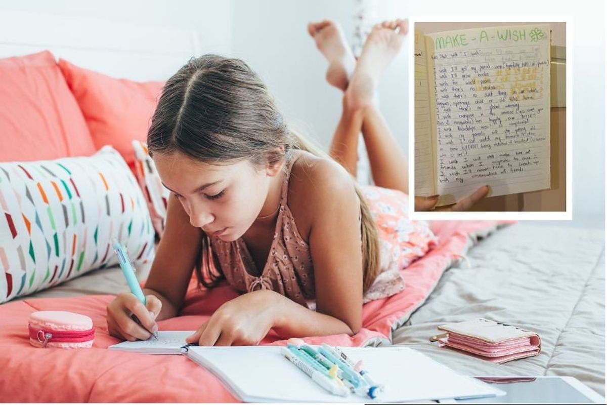 teen girl sitting in bed and writing in her diary