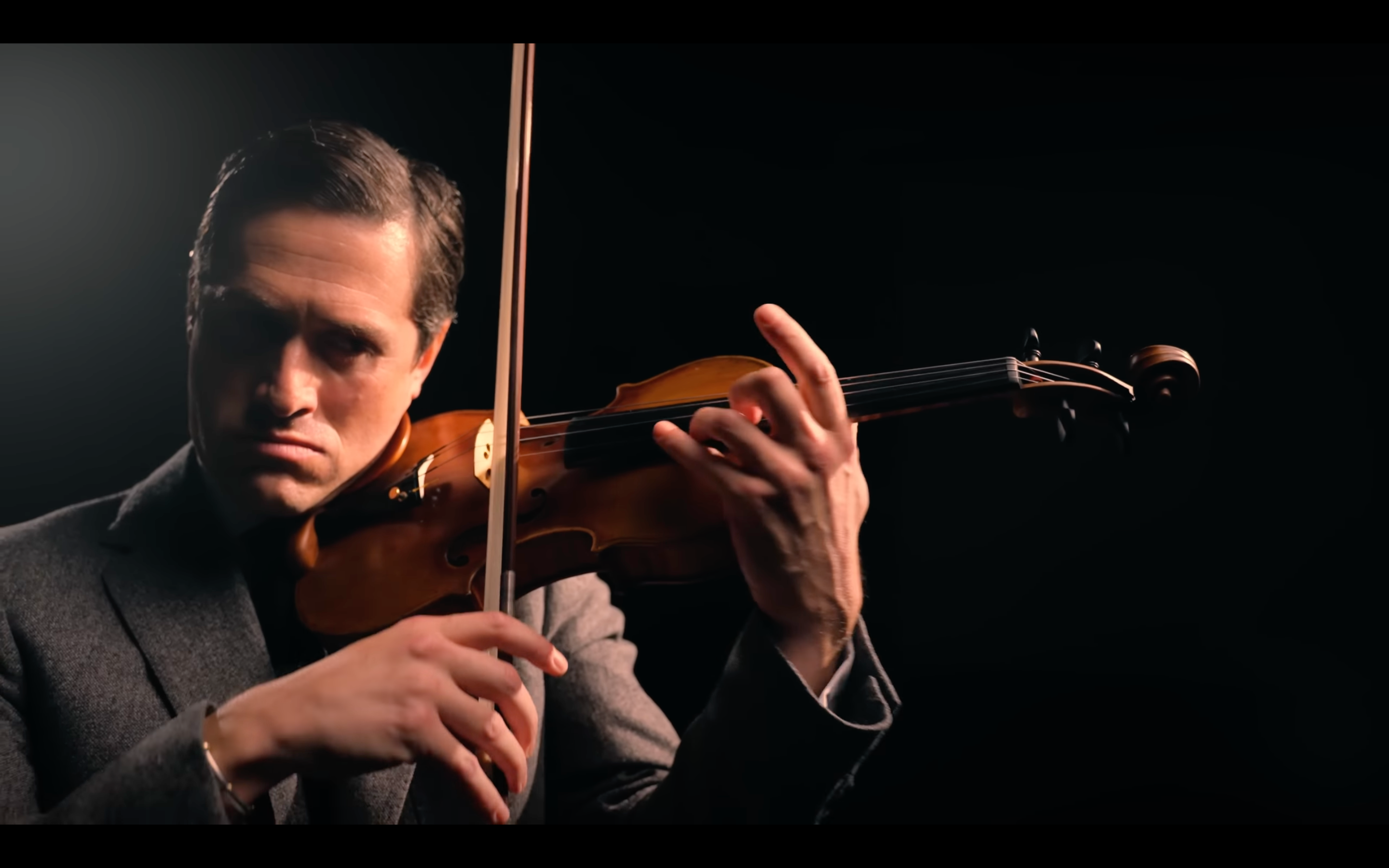 A man plays a violin 