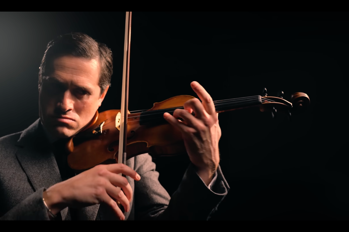 A man plays a violin