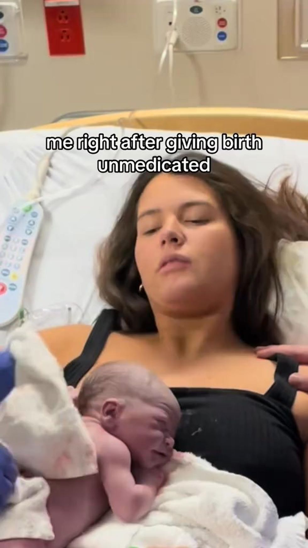 woman just after giving birth unmedicated