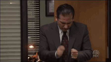 gif of Michael Scott air-drumming