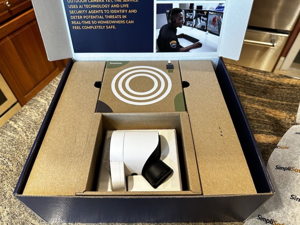 a photo of the inside of the box for SimpliSafe Outdoor Security Camera Series 2 with Active Guard