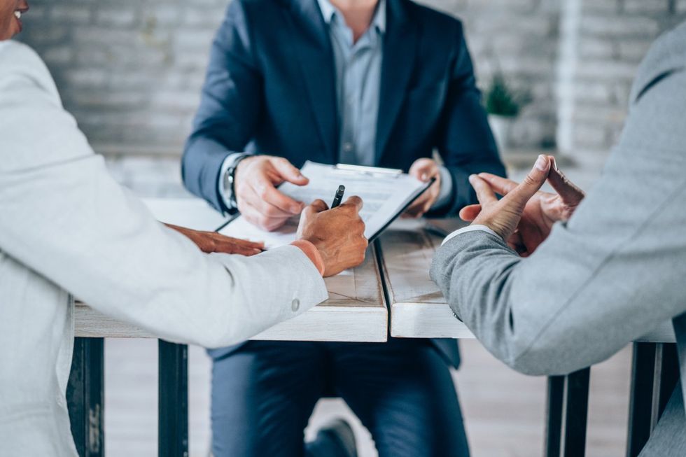 Couple meeting with financial advisor. stock photo