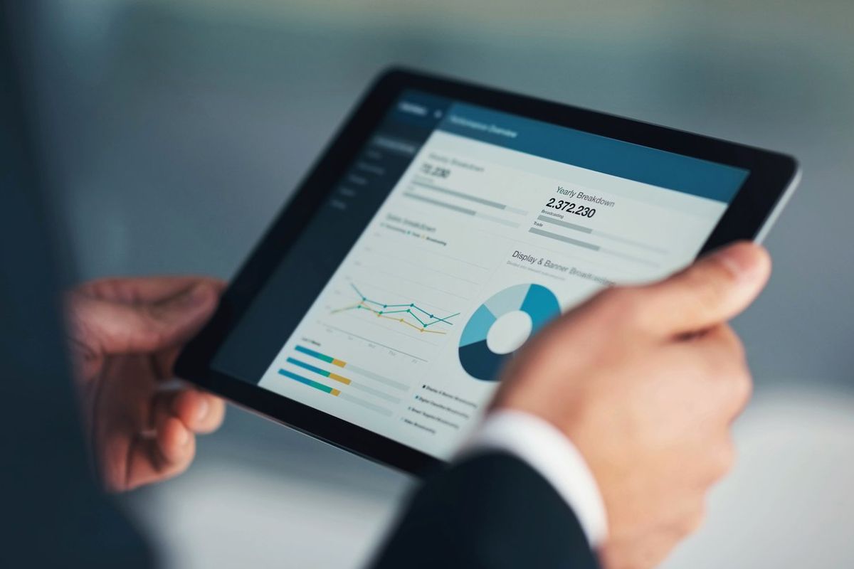 Planning, corporate or business man with tablet for investment strategy, finance growth or financial review. CEO, analytics or manager on dashboard for data analysis, reading or economy web research stock photo
