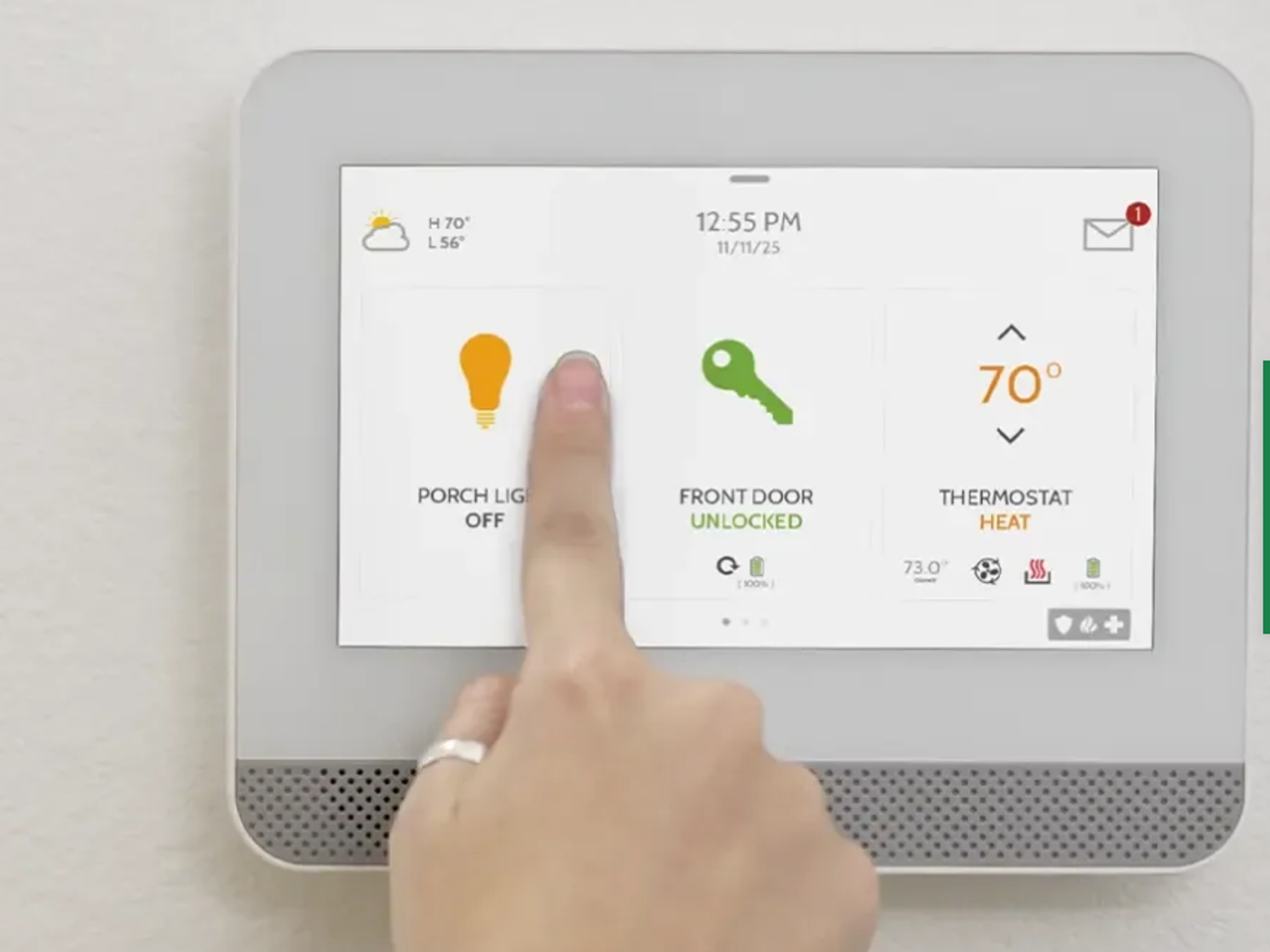 Photo of a woman's finger touching the panel for brinks home security system.