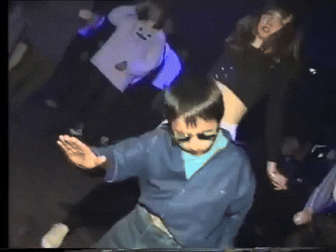 gif of kid in sunglasses dancing in a club