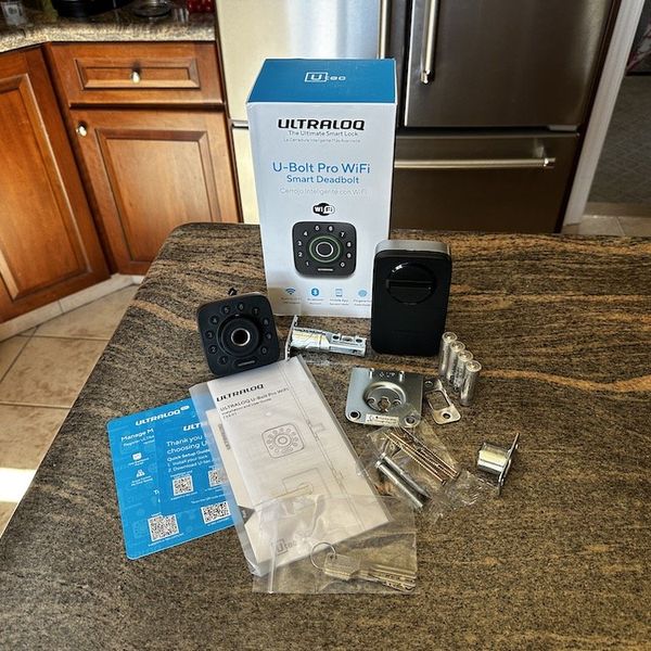 a photo of U-Tec Ultraloq U-Bolt Pro Wi-Fi Smart Deadbolt Lock  unboxed