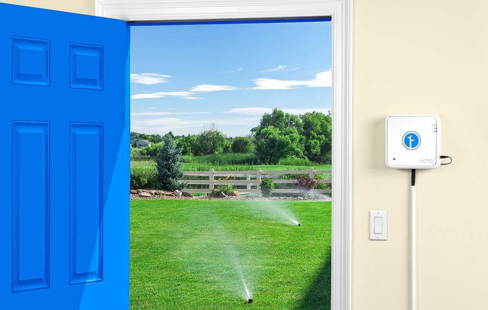 Picture of Rachio smart sprinkler controller on a wall inside a house