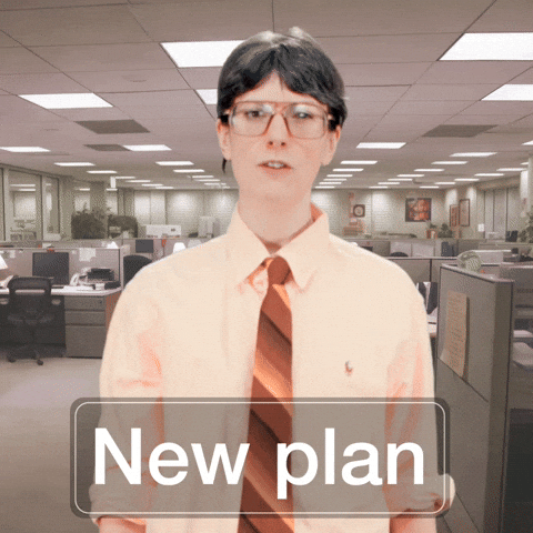 person in an office saying, "New plan."