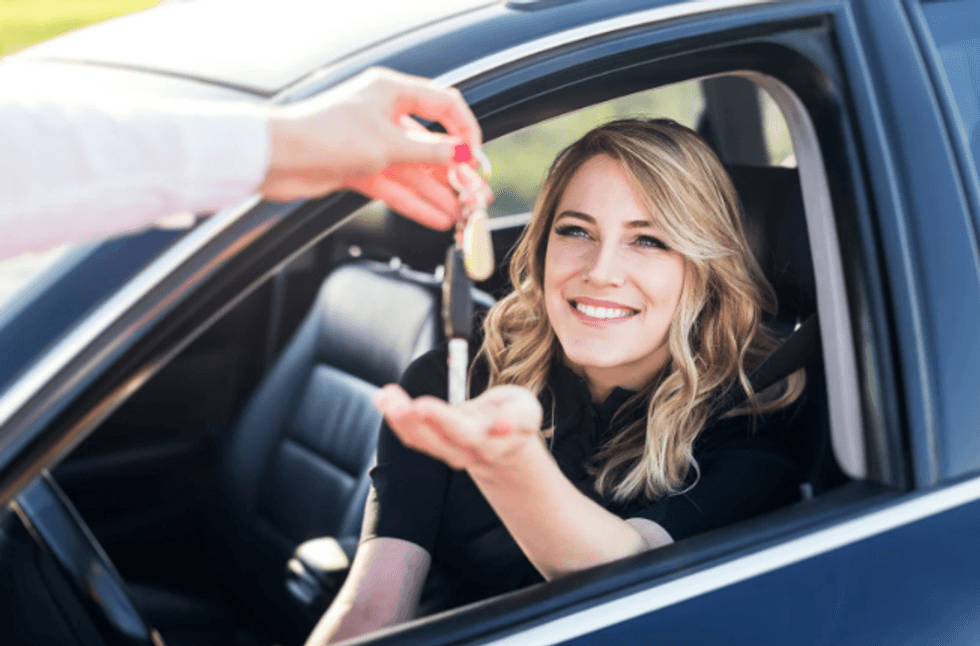 In two sentences, finance guy crushes the idea of buying a new car. But people disagree.