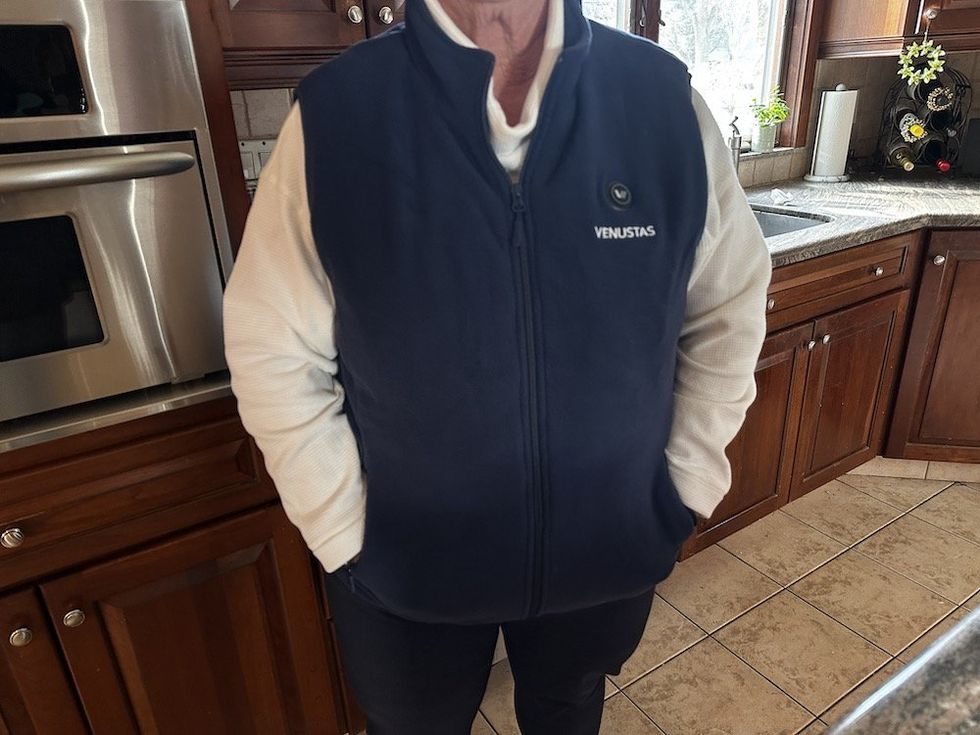a photo of a woman wearing Venustas Women's Heated Fleece Vest