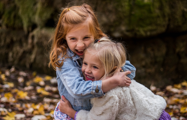 young girls, girls hugging, young children, kids playing, smart kids, thoughtful kids