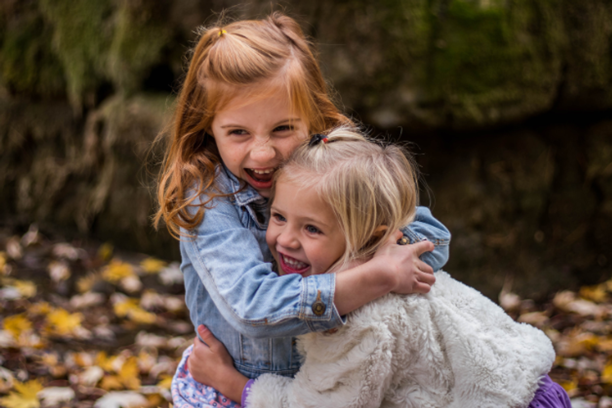 young girls, girls hugging, young children, kids playing, smart kids, thoughtful kids