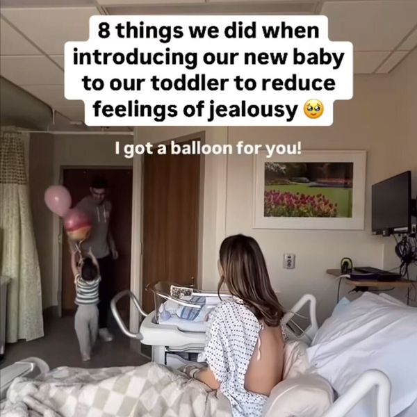 Screenshot, woman in hospital bed with child and adult man in room