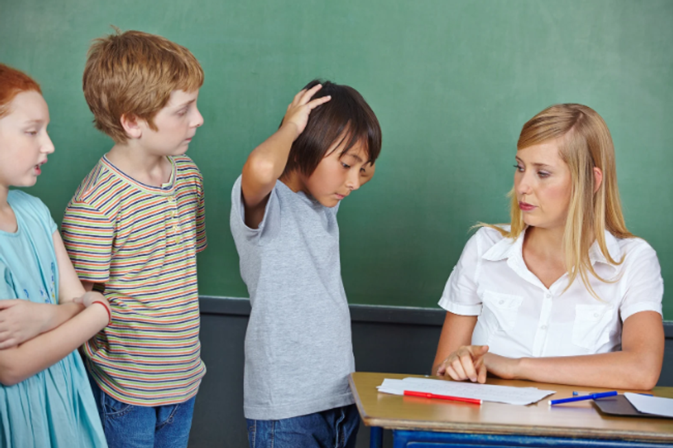 Teacher courts 'controversy' by admitting that students need to be told their reading level