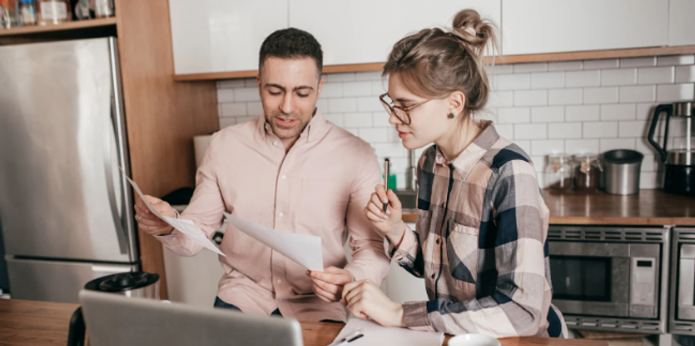 savings, retirement, couple doing bills, responsibility, wisdom, advice