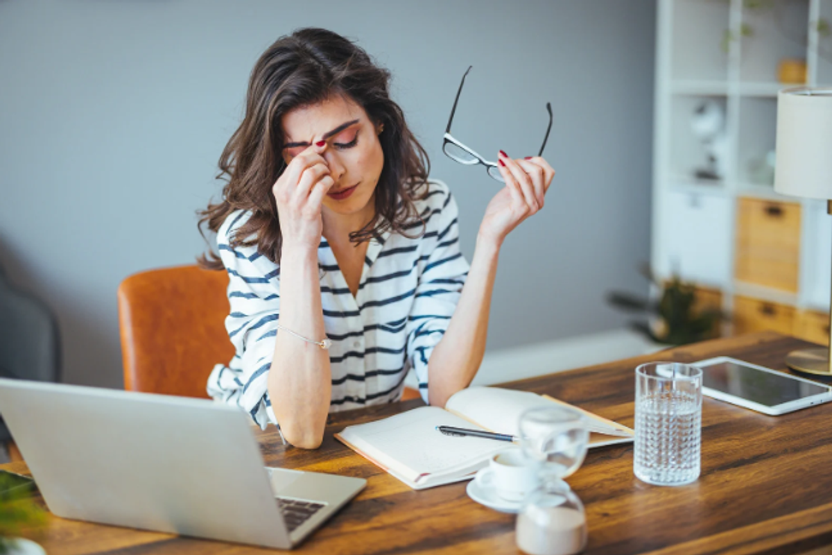 stressed woman, stressed millennial, financial stress, burnout, gen z stress, young woman, stress at work