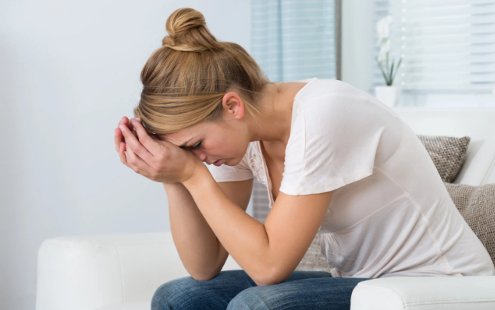 stressed woman, stressed millennial, financial stress, burnout, gen z stress, young woman