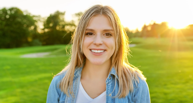 woman 30s, blonde woman, happy woman, woman listening, free woman, brown-eyed woman