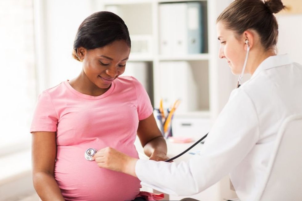 pregnant woman, black woman, black maternal health week, motherhood, doctor, 