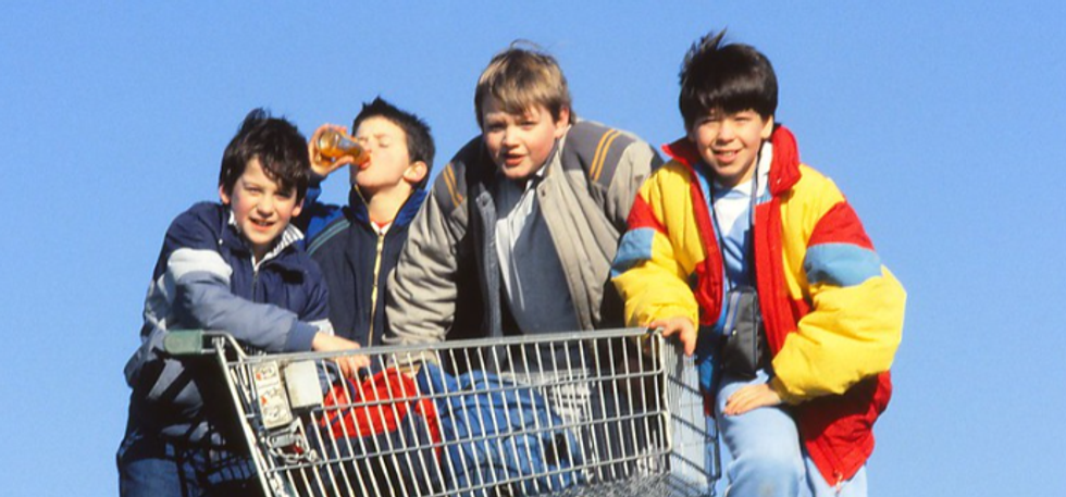 '90s kids, '80s kids, puffy jackets, kids look like goonies, shopping carts, happy kids, free kids