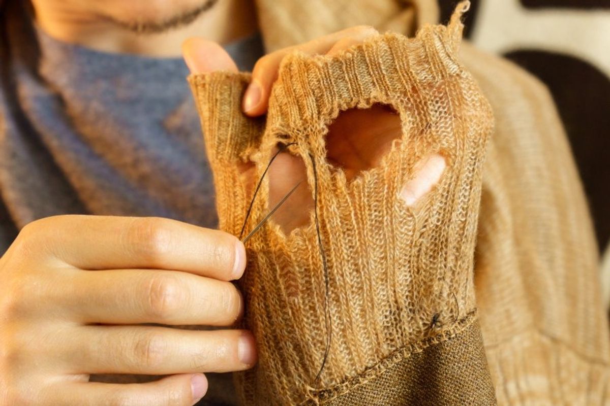 mending a sweater, darning sweater, fixing a hole in a sweater, knitting