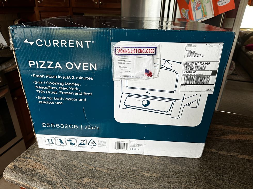 a photo of the box for Current Backyard Model P Smart Pizza Oven