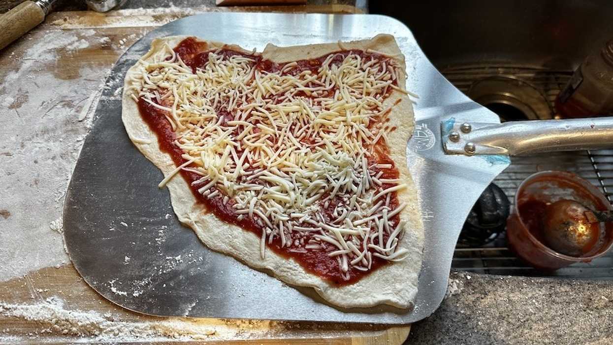 Pizza on a pizza peel