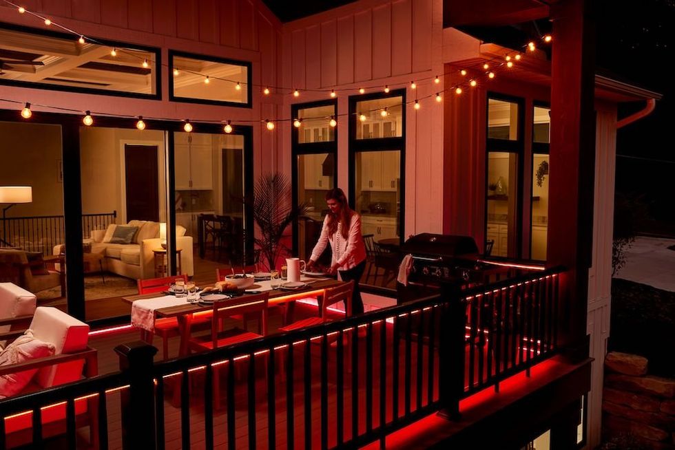 photo of GE Cync Dynamic Effects Smart Caf\u00e9 Lights lighing up a patio