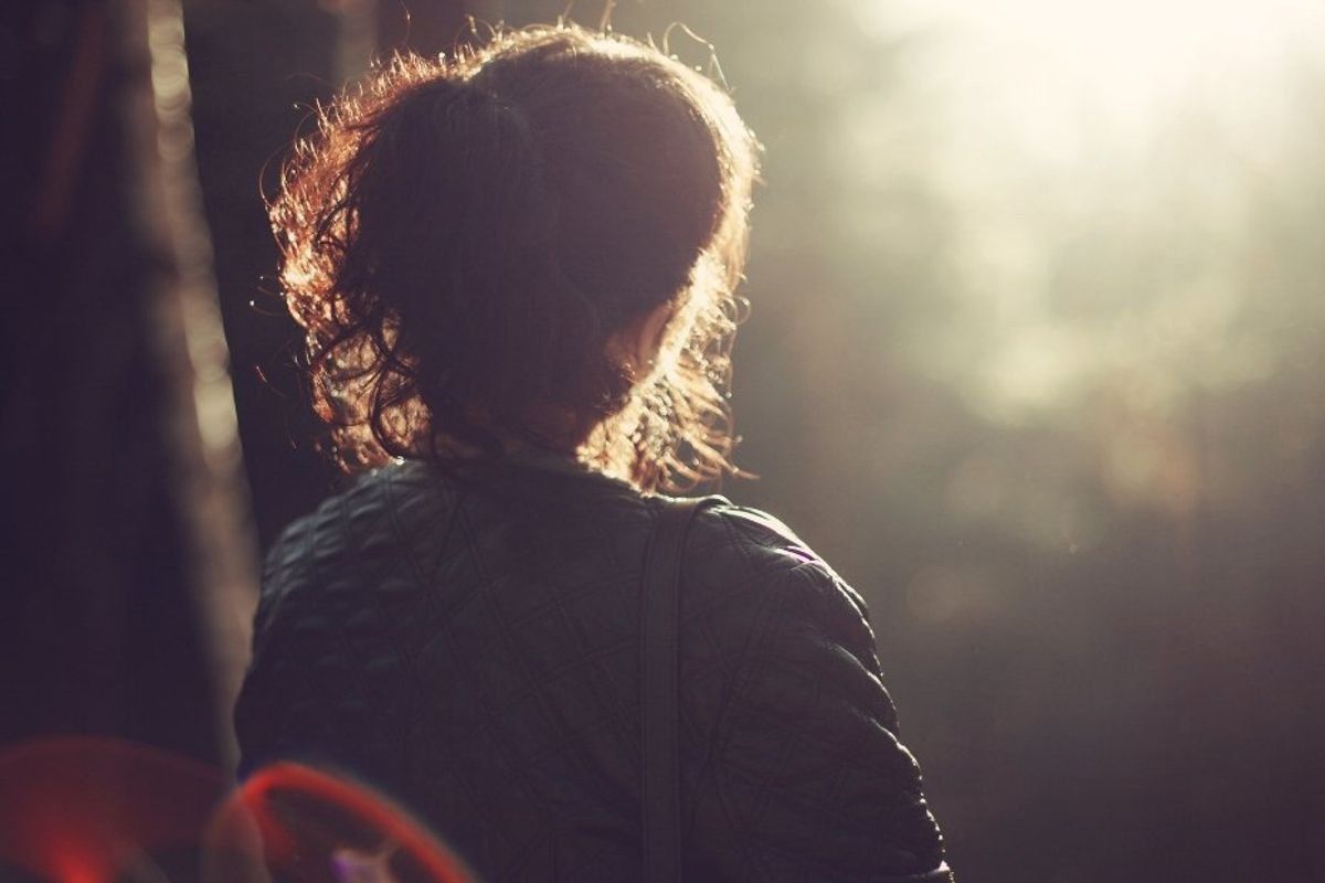 woman sitting alone, solitude, being by yourself, enjoying alone time