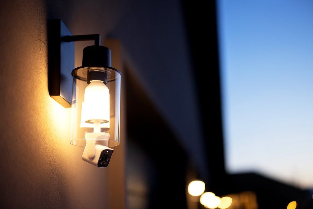 photo of Wyze Bulb Cam installed on a house outside.