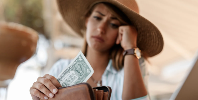 broke, bills, paycheck to paycheck, scared woman, finances, american life
