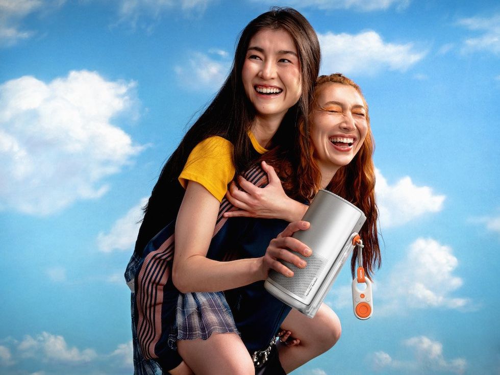 photo of two girls with XGIMI MoGo Portable Projector
