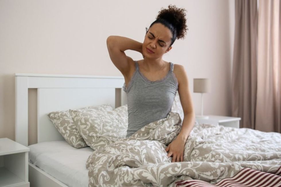 perimenopause; stiff neck; best pillow; pillow for stiff neck; menopause; women and stiff neck; tension headaches