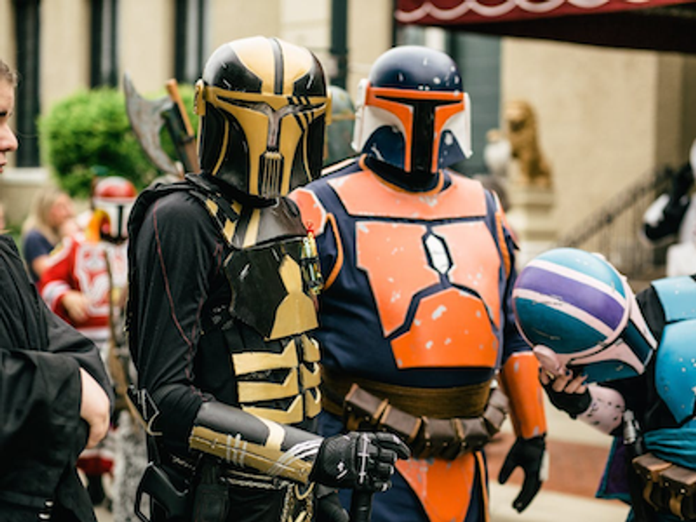 Person in Black and Yellow Costume